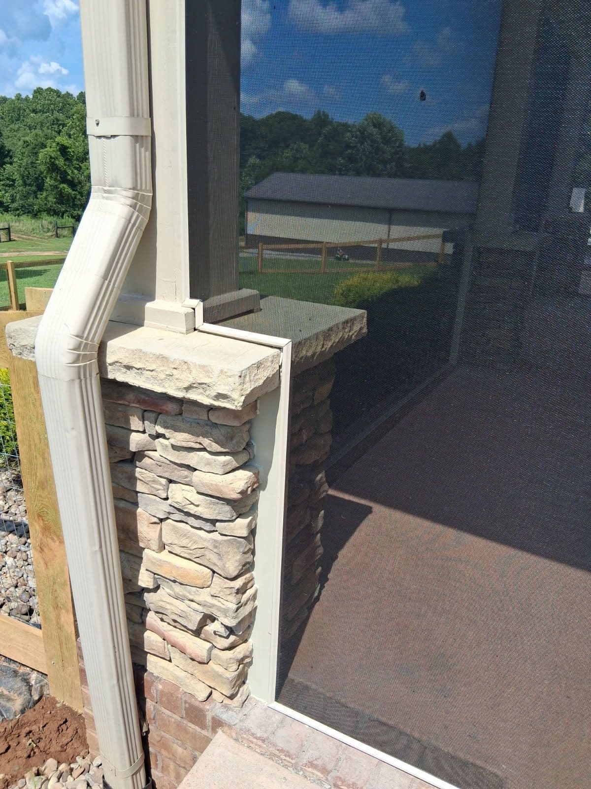 Screen Porch with Stylish Stone Pillars in Clarksville image