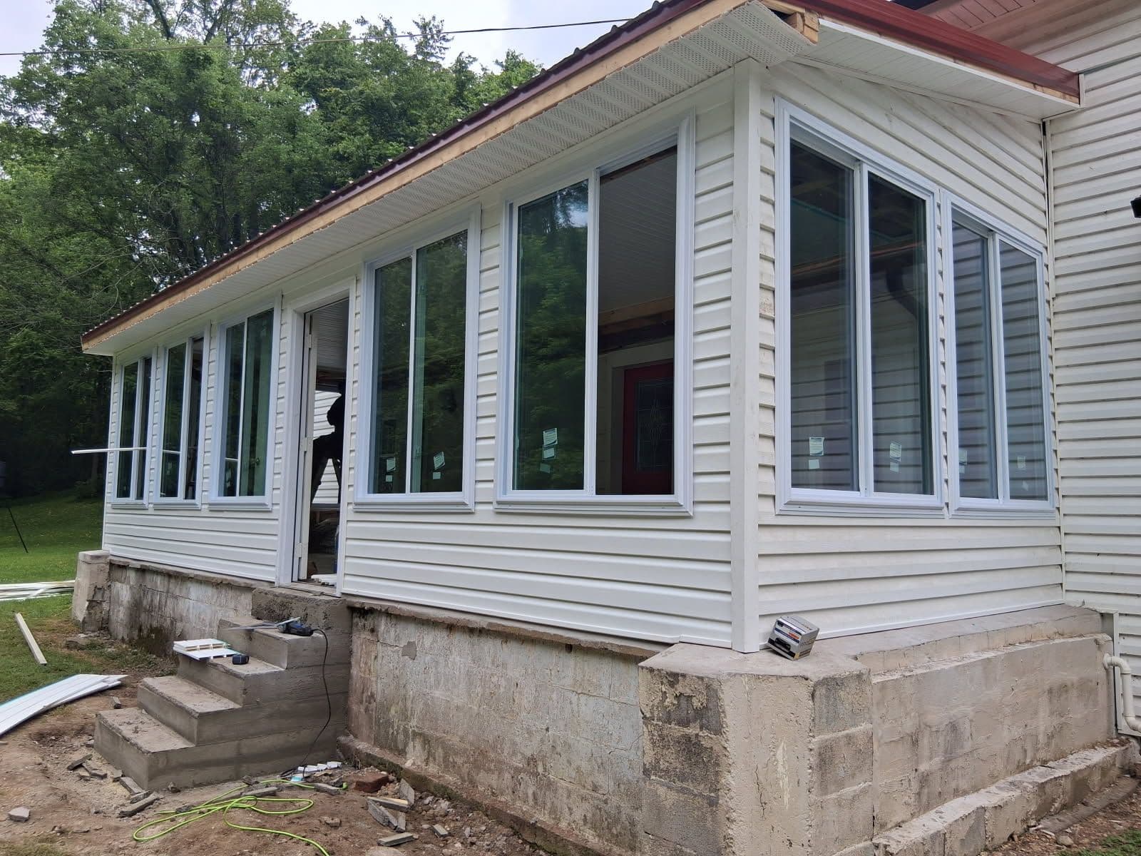 Gallery photos for New Stylish Sunroom Enhances Home Comfort: Image #1